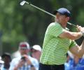 PGA Championship: McIlroy grabs lead as Woods falters