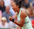 French Open PIX: Zheng knocks out Halep; Tsitsipas survives