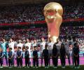 Iran players resume singing of national anthem at World Cup match