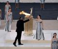 PIX: Paris organisers receive Olympic flame in Athens