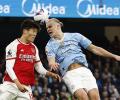 EPL PIX: Arsenal hold City; open up title race for Liverpool