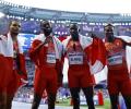 PIX: Canada win men's sprint relay as US blow it; Chebet double