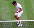 Wimbledon PIX: Alcaraz, Sinner ease into quarter-finals