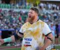 In-form Crouser eyes shot put record at Olympic tune-up event