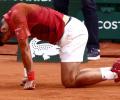 Djokovic unsure about French Open quarter-finals after knee injury