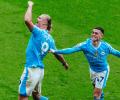 EPL PIX: Manchester City thump Wolves; Arsenal down Bouremouth