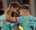 Soccer: Barca closer to top two finish with win over Almeria