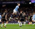 Champions League PIX: Big wins for City, Barca; Atletico stunned