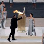 PIX: Paris organisers receive Olympic flame in Athens