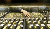 Gold tumbles on weak global cues, sluggish demand