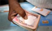 Rupee ends higher in line with Asian peers
