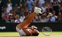 Wimbledon PHOTOS: Defending champ Kvitova knocked out; Federer wins