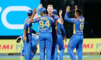 IPL PHOTOS: Buttler, bowlers keep RR alive, beat KXIP by 15 runs