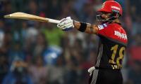 IPL PHOTOS: Kohli, de Villiers keep RCB's hopes alive