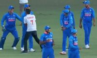 Run for a hug: Fan breaks security to embrace Dhoni