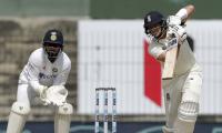 Root marks milestone with ton on Day 1