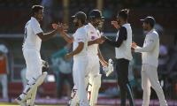 PIX: India bat through final day to snatch draw at SCG