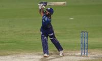 IPL PIX: Mumbai humble Royals to stay in play-off race