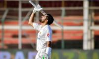 Babar's century stalls Australia's victory march