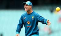 Warner laughs off early retirement talks