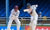 PICS: India wrest control after Windies bowlers strike