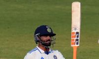 PIX: Rohit, Jadeja, Sarfaraz put India in control