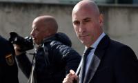 Spanish court slaps ex-soccer coach with fine over kiss