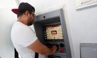 No more ATM withdrawal limits from Feb 1: RBI