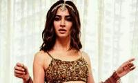 WATCH: Kriti turns boho bride in gold bralette