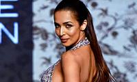 WATCH: Malaika reveals svelte bod in a backless gown