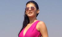 Pics: Amyra Dastur hits the beach in a bikini