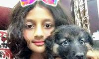 Our li'l reader takes a cute selfie with her pet