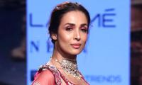 Red hot! Malaika sizzles in a lehenga-choli