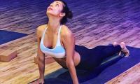 Malaika shows you how to do the PERFECT cobra pose 