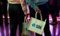 SBI Q4 profit jumps 80% as NPAs decline