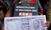 Govt, Opposition battle it out on note ban anniversary