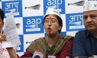 Atishi breaks down over obscene pamphlets; BJP denies