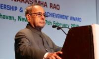 Amid Oppn uproar, Pranab hails EC for 'perfect' polls