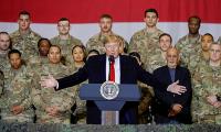 On surprise Afghan visit, Trump says peace talks on