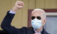 No shutdown, Biden insists on national mask mandate