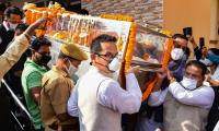 PIX: Tarun Gogoi sets on his final journey