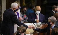 PIX: Fist bumps greet US Congress ratifying Biden win