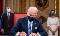 On Day 1, Biden signs 15 executive orders