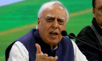 Gandhis should step aside, says Sibal; Cong hits back