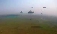 600 army paratroopers jump off plane in airborne drill