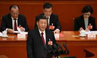 Xi vows to build China into 'Great Wall of Steel'