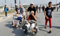 Gaza hospital cut off as tanks surround it: WHO