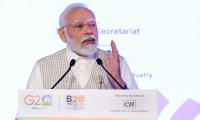 Modi dismisses China's objections over...