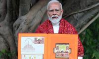 PM releases postage stamps on Ram temple