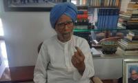 PIX: Manmohan Singh, Advani cast votes from home